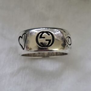 Gucci Silver Band with Heart and Eye Motifs